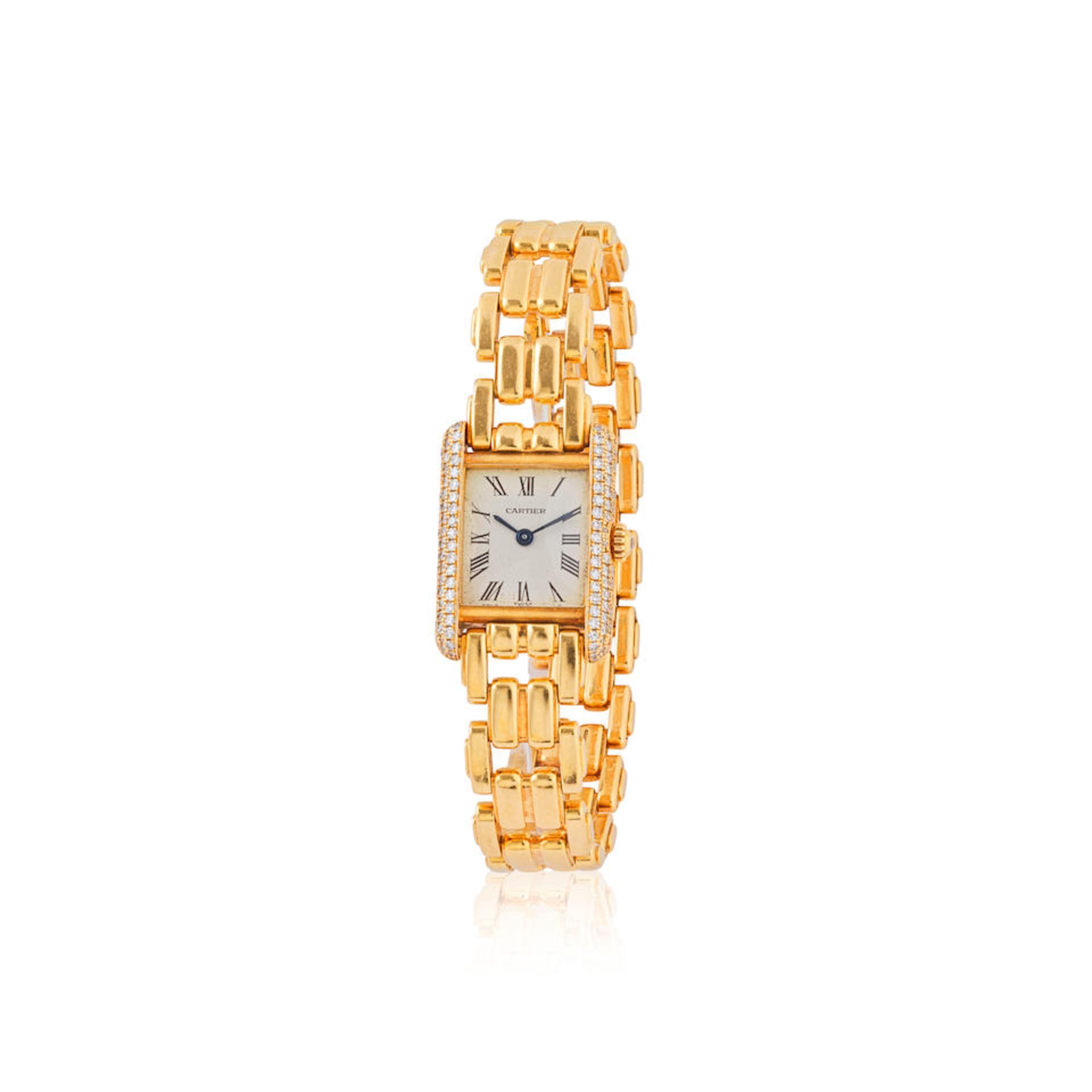 Cartier. A lady's 18K gold and diamond set quartz bracelet watch Cartier. Montre bracelet de dam...