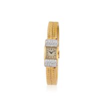 Cartier. A fine Art Deco style 18K gold lady's manual wind cocktail watch with diamond set bezel...