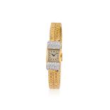 Cartier. A fine Art Deco style 18K gold lady's manual wind cocktail watch with diamond set bezel...