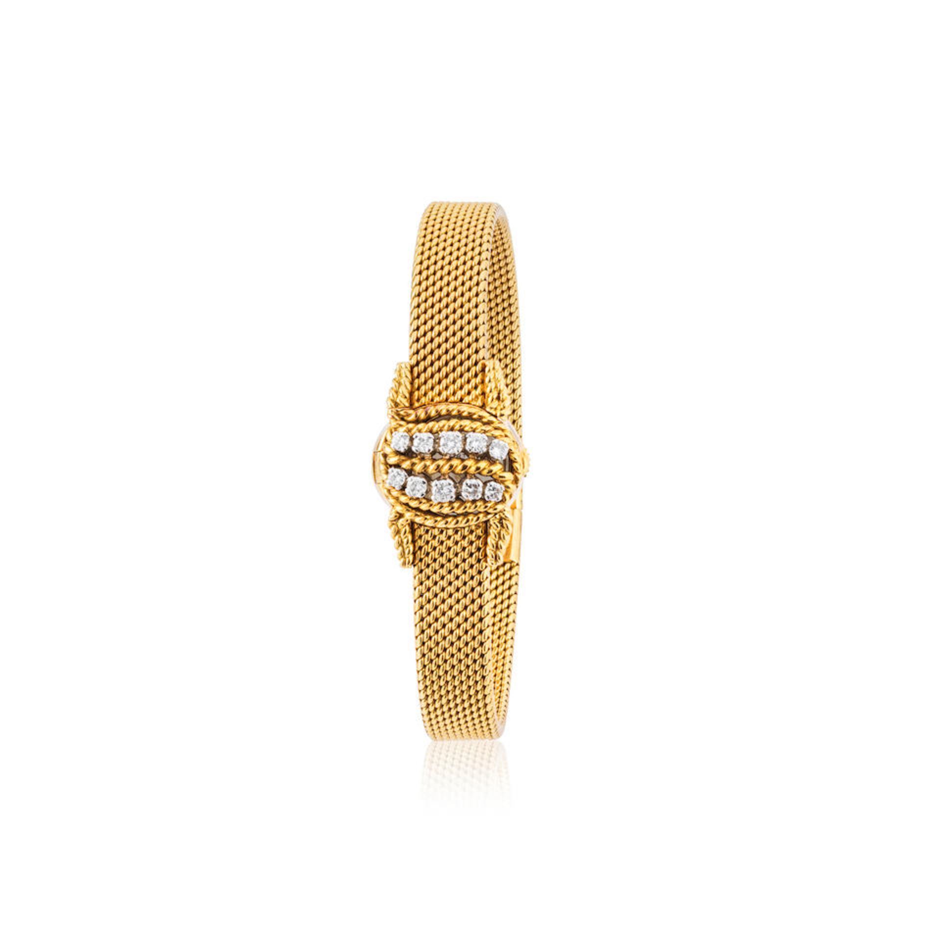 Cartier. A fine lady's 18K gold manual wind bracelet watch with diamond set and concealed dial C...