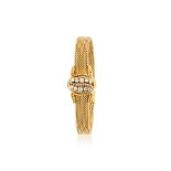 Cartier. A fine lady's 18K gold manual wind bracelet watch with diamond set and concealed dial C...