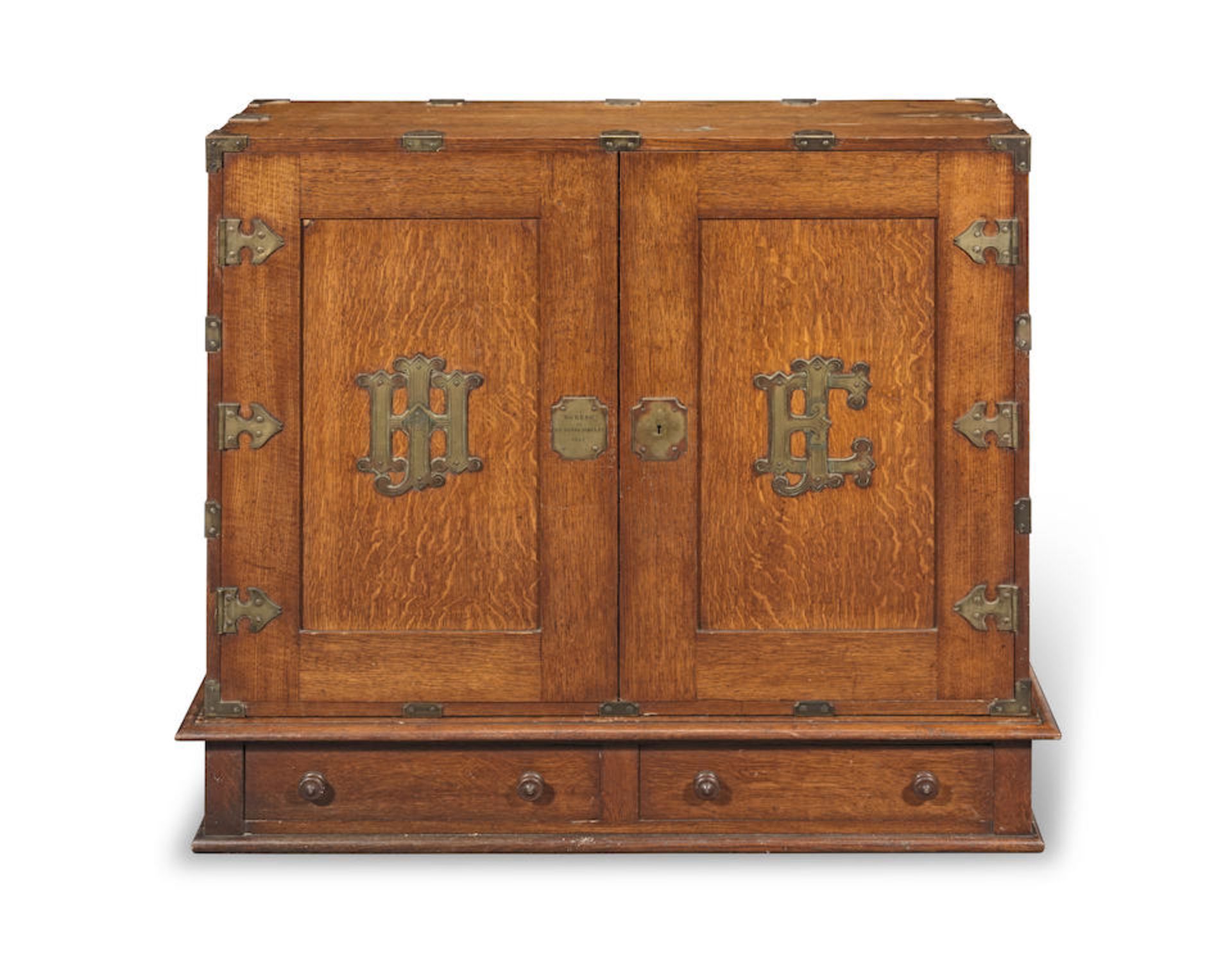 A mid Victorian brass mounted oak campaign or 'travelling' cabinet made for and originally belon...