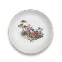 A Meissen saucer decorated with a peasant scene, circa 1750-60