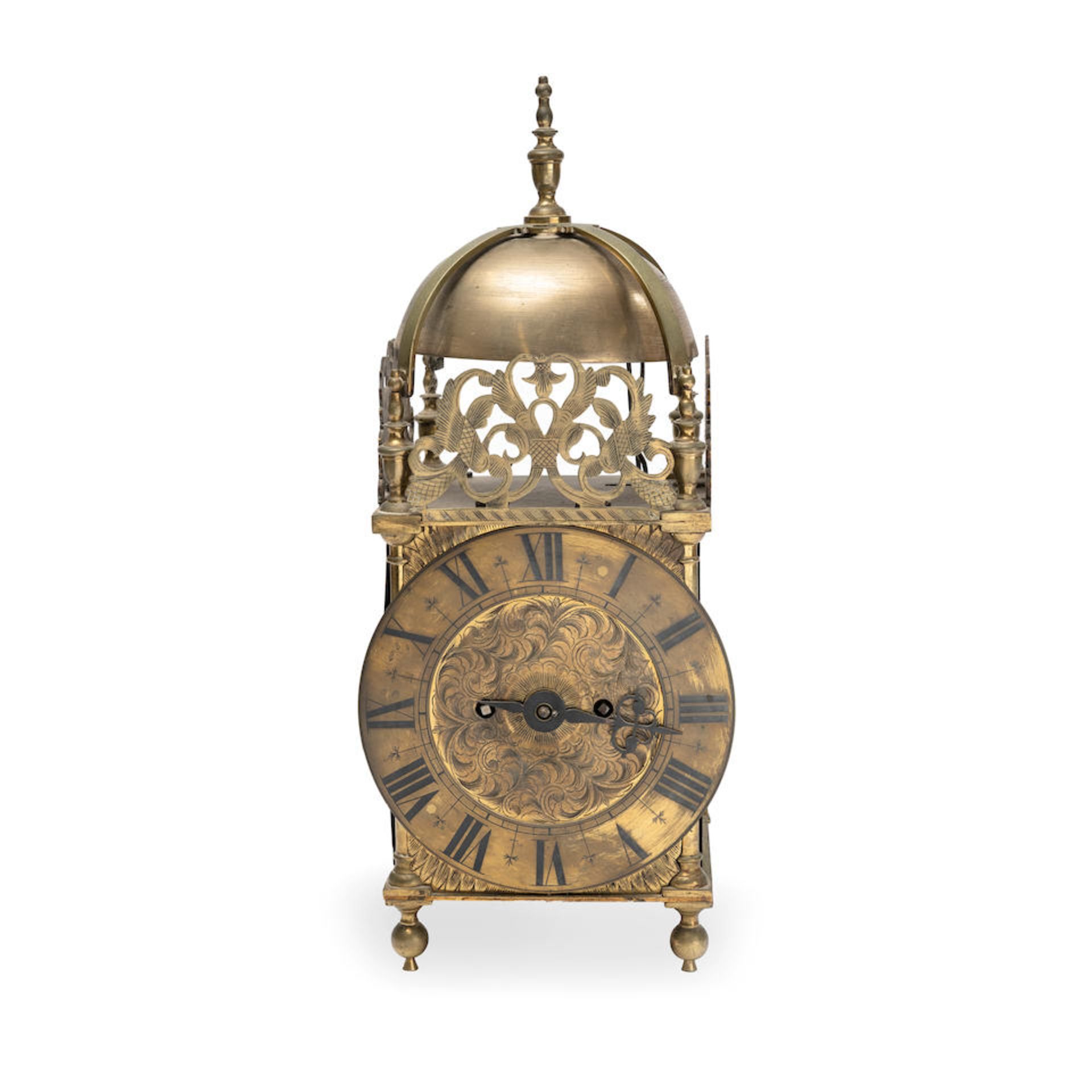 A 19th century brass lantern clock in the 17th century style