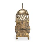 A 19th century brass lantern clock in the 17th century style