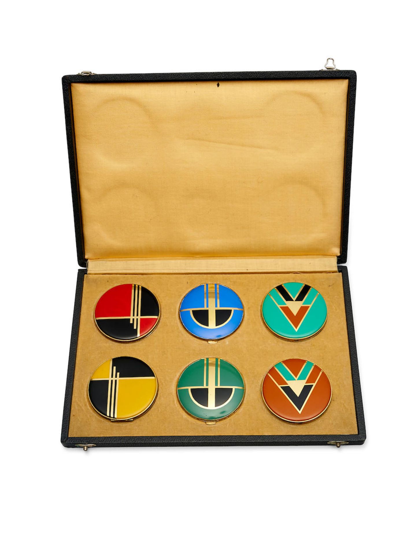 A GROUP OF SIX ENAMEL AND GILT METAL COMPACTS