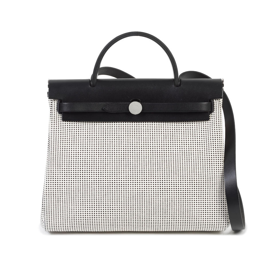 Hermès: a Black and White Vache Hunter Leather and Toile Quadrille 31 Herbag 2021