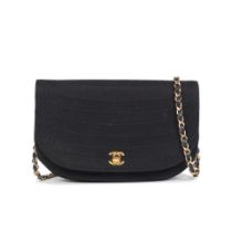 Karl Lagerfeld for Chanel: a Black Jersey Demi Lune Shoulder Bag 1986-88 (includes serial sticker)