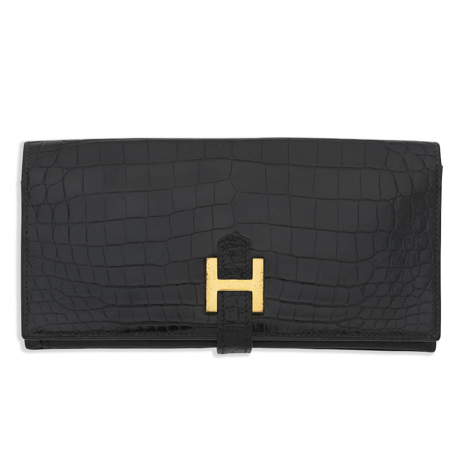 Hermès: a Shiny Black Porosus Crocodile Bearn Wallet 1980s