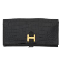 Hermès: a Shiny Black Porosus Crocodile Bearn Wallet 1980s