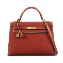 Hermès: a Brique Contrast Stitching Box Leather Sellier Kelly 32 1993 (includes padlock, ke...