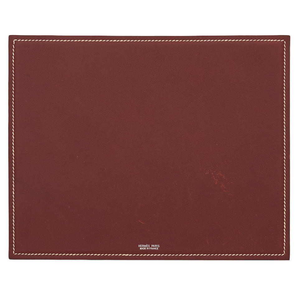 Hermès: a Rouge H and Rouge Vif Leather Mousepad 2000