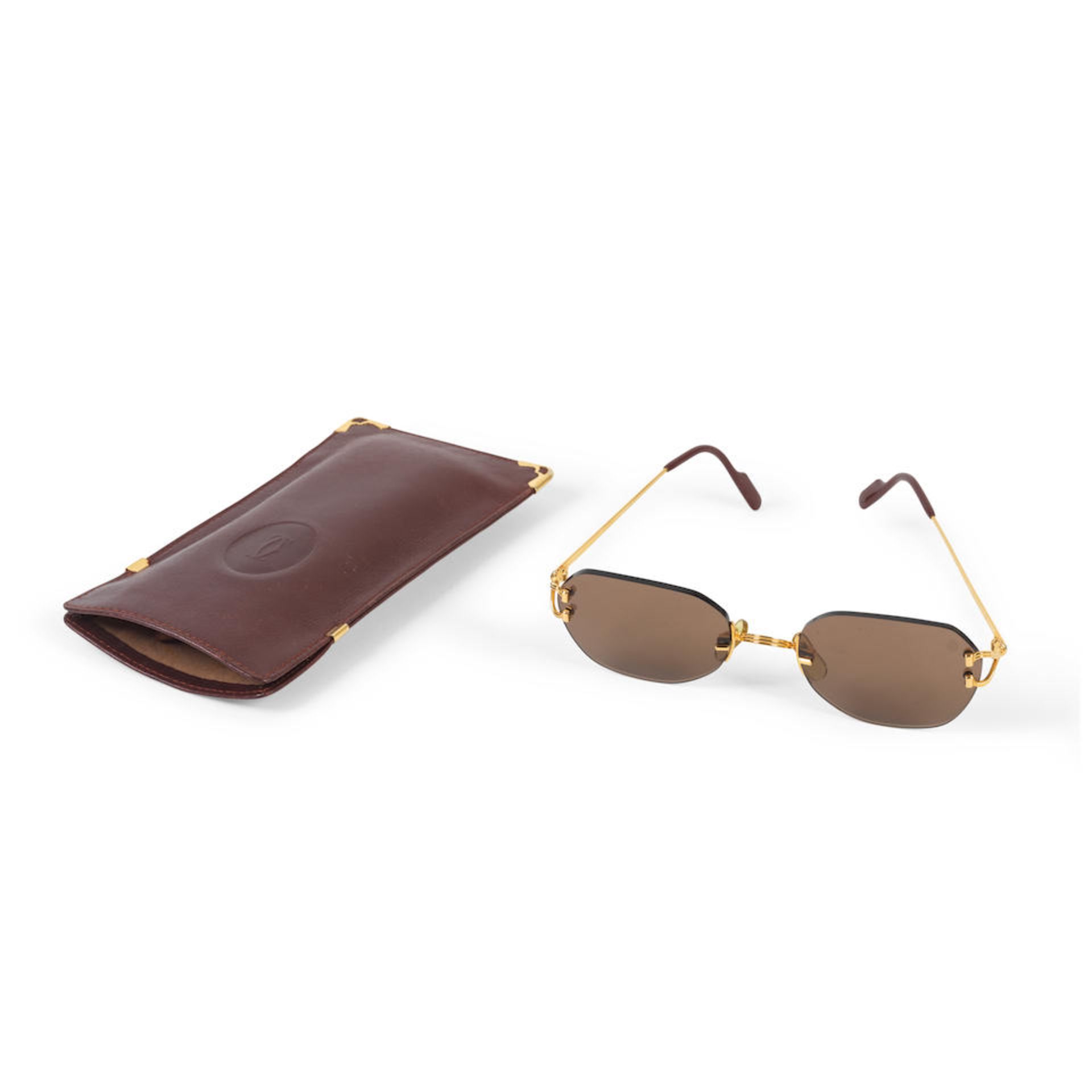 Cartier: a Pair of Rimless C de Cartier Sunglasses (Includes pouch)