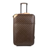 Louis Vuitton: a Monogram Pegase 65 Rolling Suitcase 2006 (includes leather pull and luggage tag)