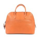 Hermès: an Orange Chevre Leather Web Bolide 30 2006