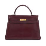 Hermès: a Rouge H Box Leather Retourne Kelly 32 1960s
