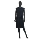 Christian Dior: a Black Silk and Wool Peplum Dress