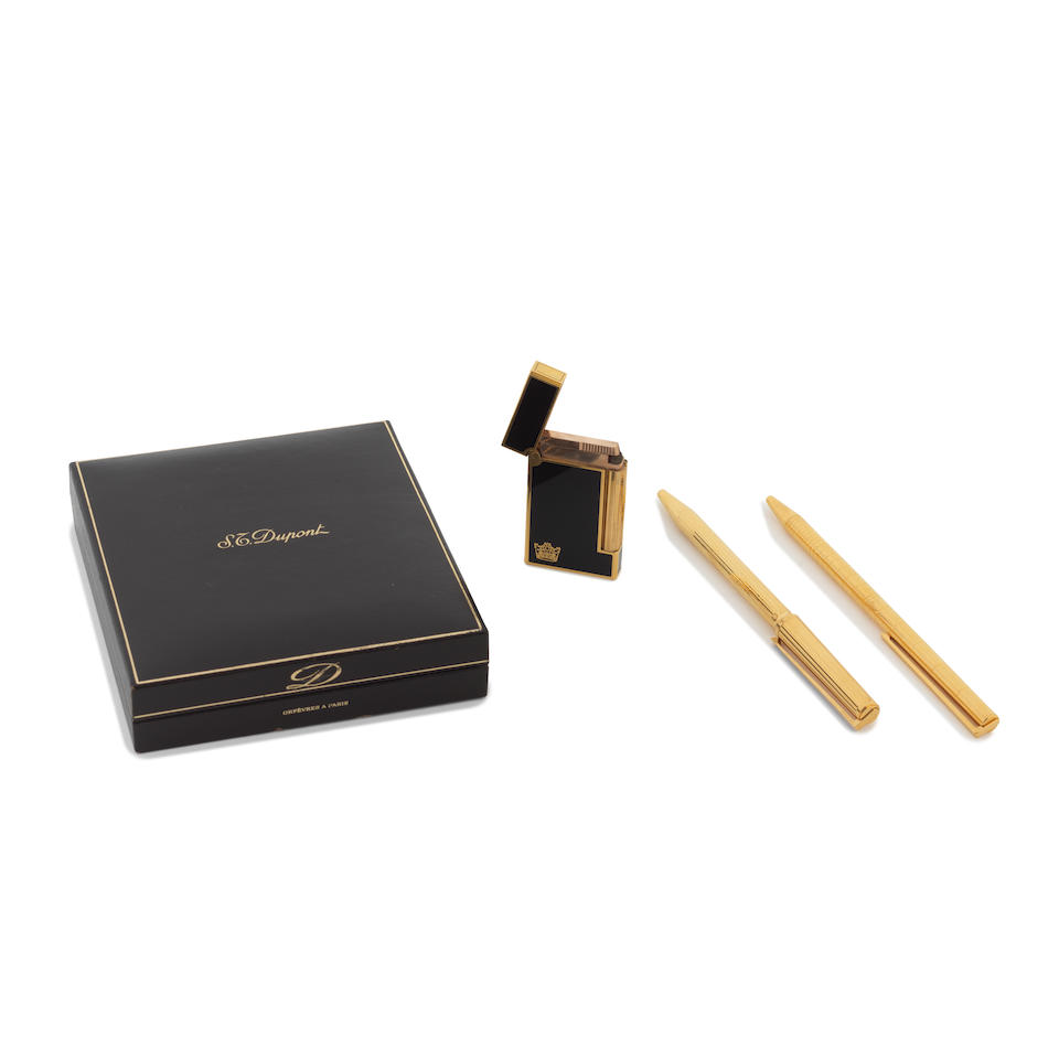 S.T. Dupont: a Lighter and Two Gold Pens (includes a box)