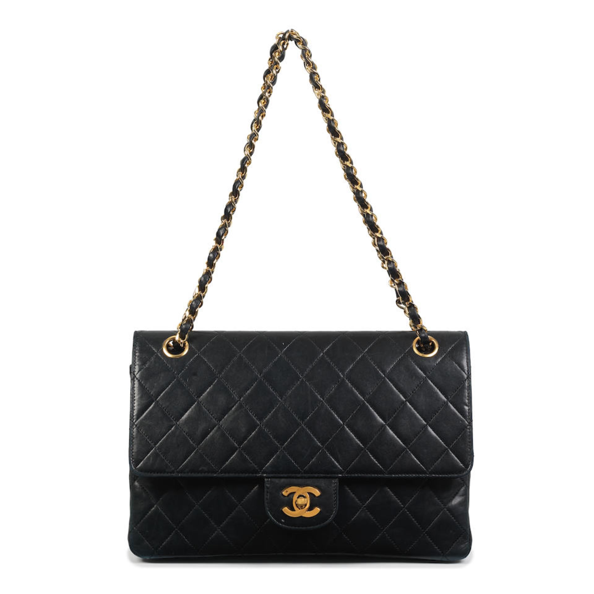 Karl Lagerfeld for Chanel: a Black Quilted Lambskin Classic Double Flap Bag 1989-91 (includes se...