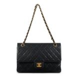 Karl Lagerfeld for Chanel: a Black Quilted Lambskin Classic Double Flap Bag 1989-91 (includes se...