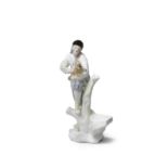 Rare statuette de Capodimonte repr&#233;sentant un homme tenant entre les bras un chien ou un re...