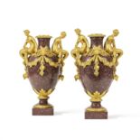 Paire de vases de style Louis XVI en porphyre, ornementation de bronze dor&#233;, XIXe si&#232;c...