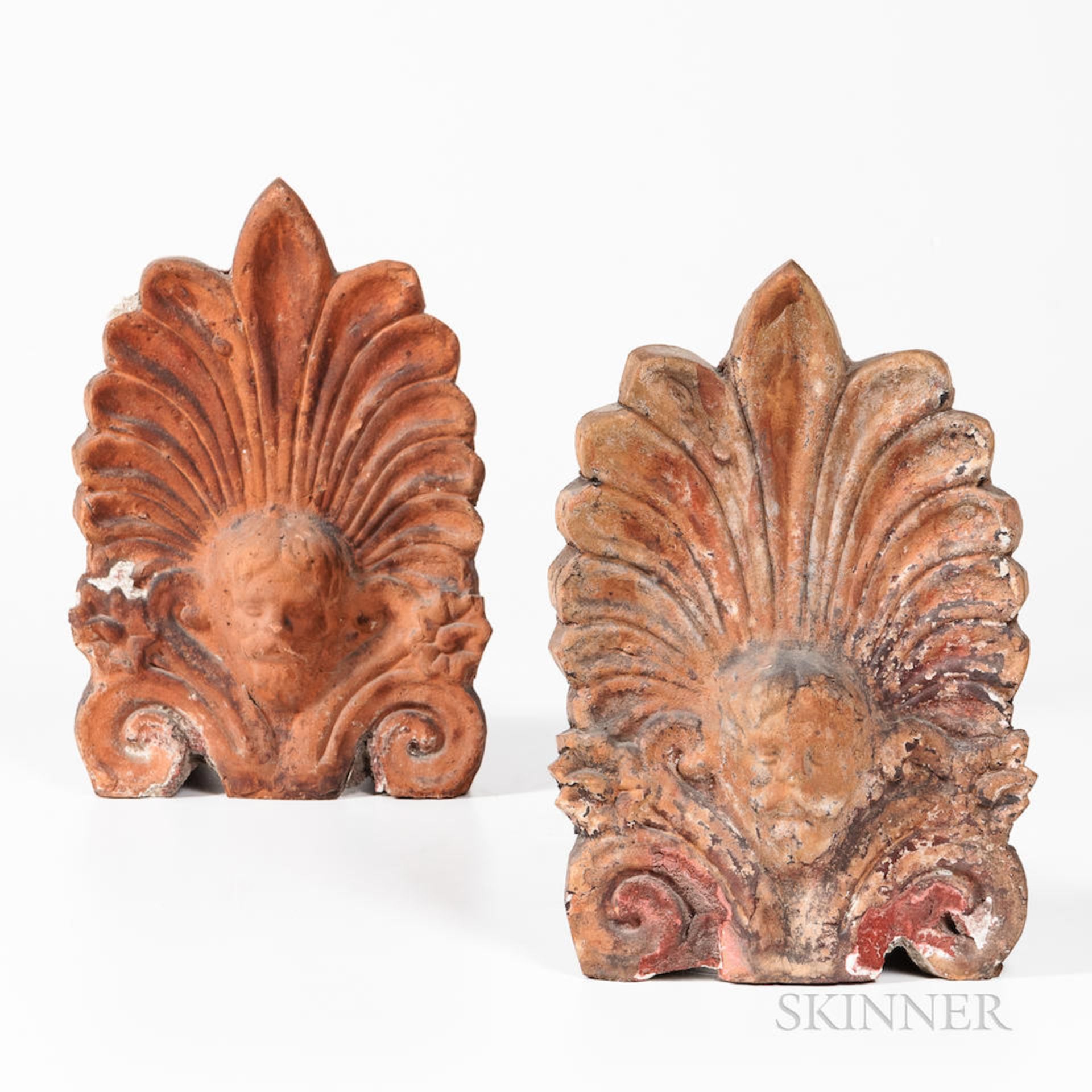 Pair of Terra-cotta Roof Tiles Architectural Elements, 18th century, each with anthemion and mas...