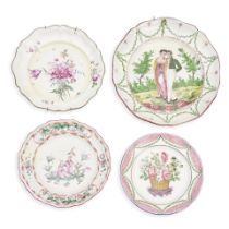 FOUR FAIENCE PLATES