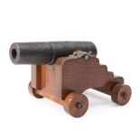 Miniature Cast Iron Naval Cannon and Carriage.
