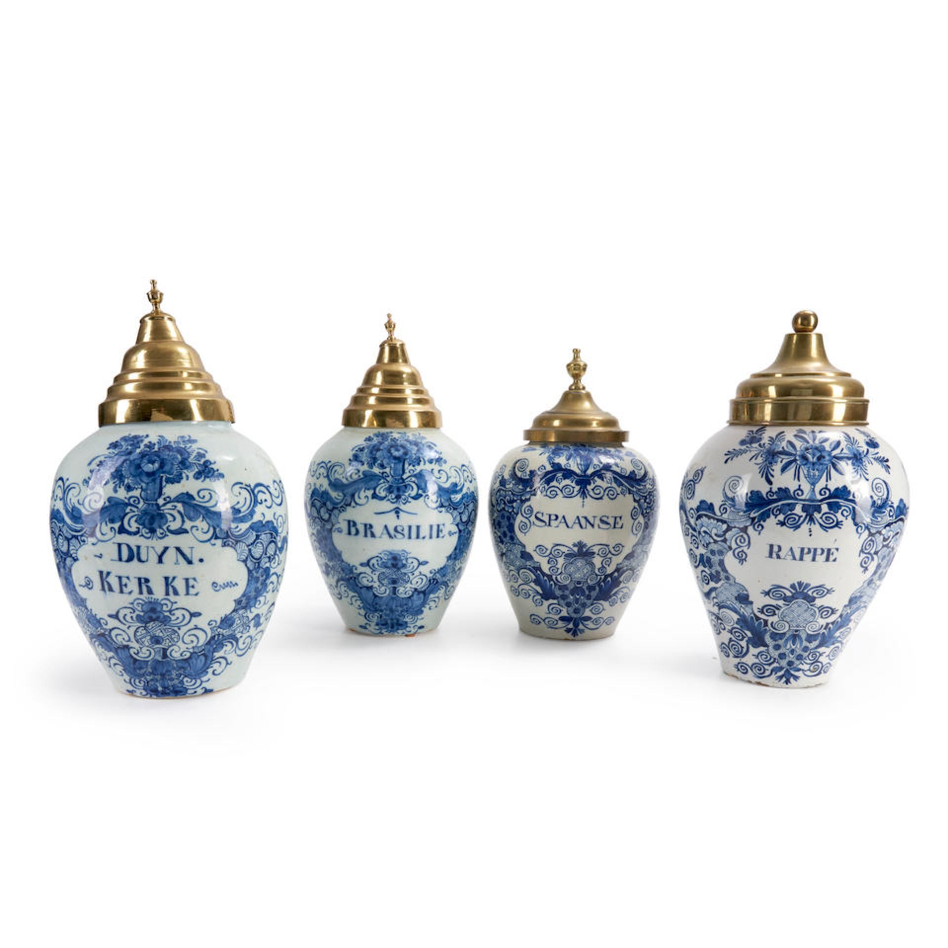 Four Delftware Tobacco Jars with Brass Covers, Holland, 18th century.