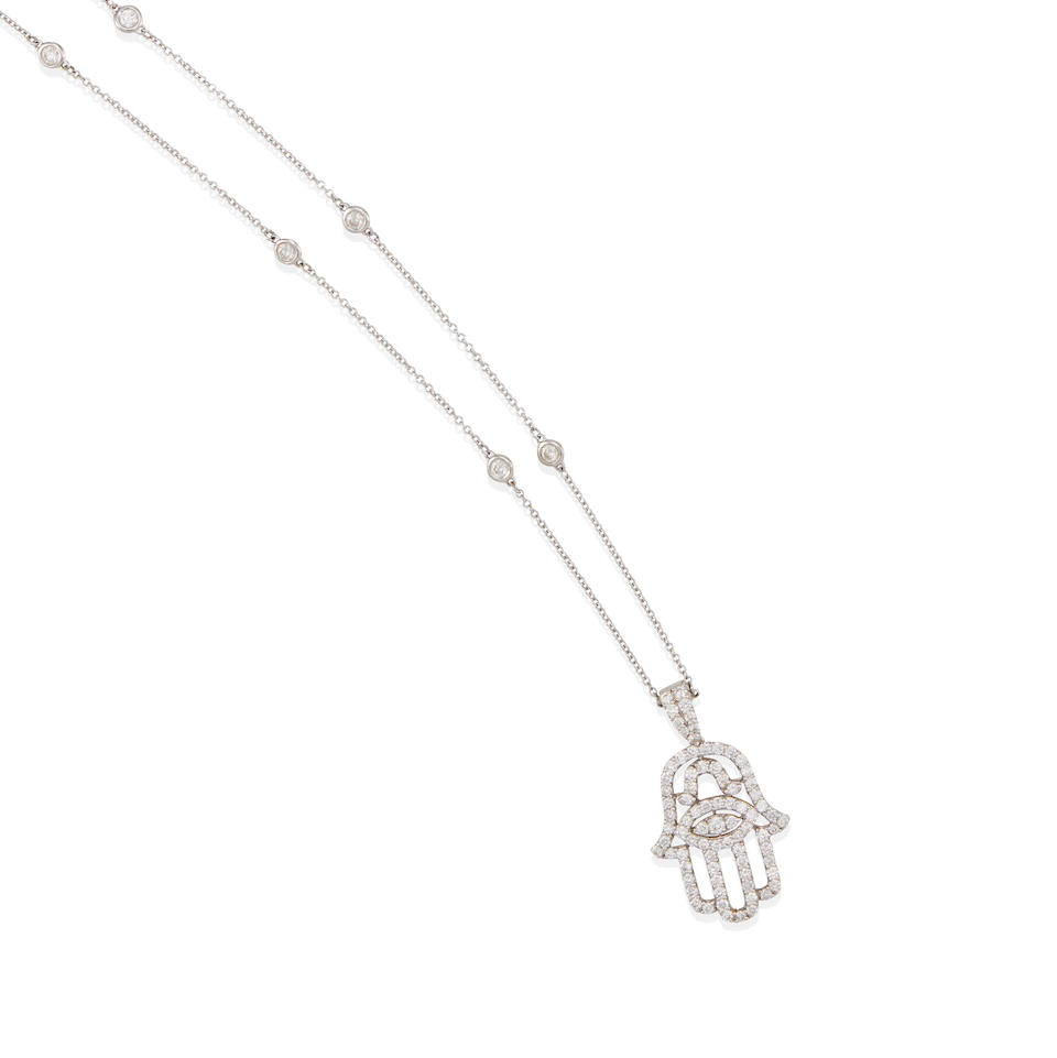 A WHITE GOLD AND DIAMOND HAMSA PENDANT NECKLACE