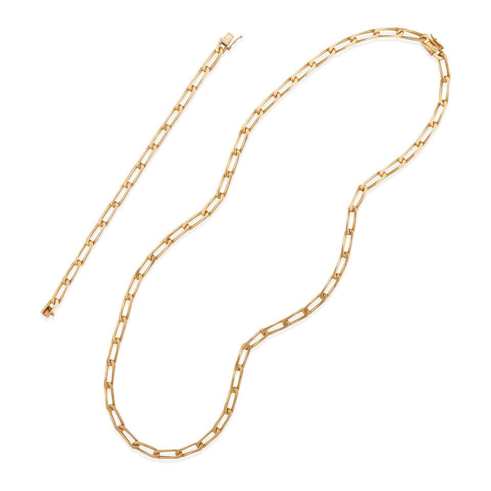 CARTIER: AN 18K GOLD LINK NECKLACE, WITH 14K GOLD BRACELET