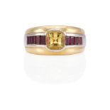 AN 18K BI-COLOR GOLD, HELIODOR AND RUBY RING