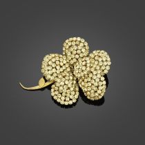 Yves Saint LAURENT, circa 1966/1970. Broche fa&#231;on joaillerie en forme de fleur jaune.