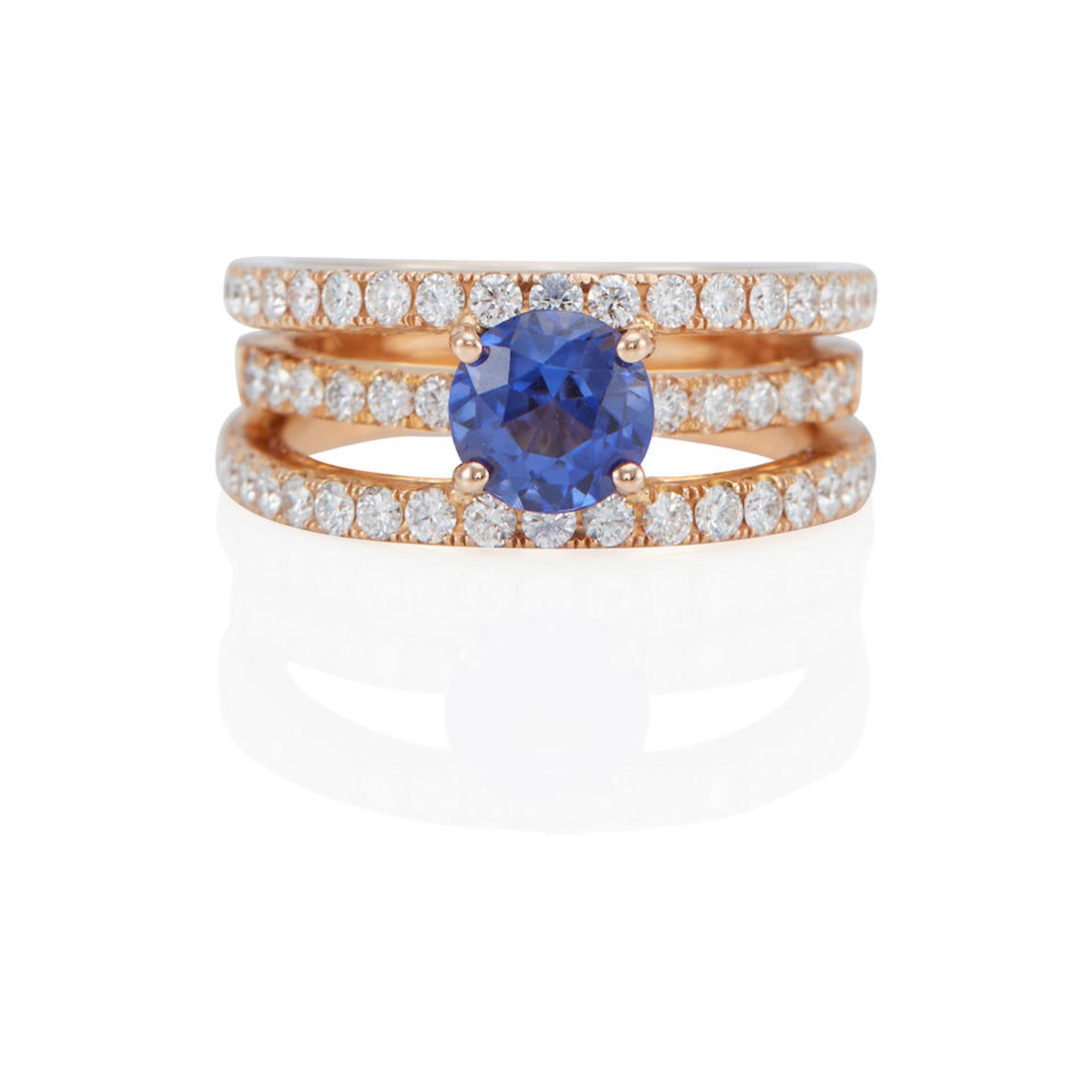 AN 18K ROSE GOLD, SAPPHIRE, AND DIAMOND RING