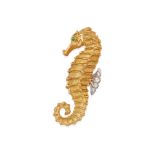 TIFFANY & CO.: AN 18K BI-COLOR GOLD, DIAMOND AND EMERALD SEAHORSE BROOCH