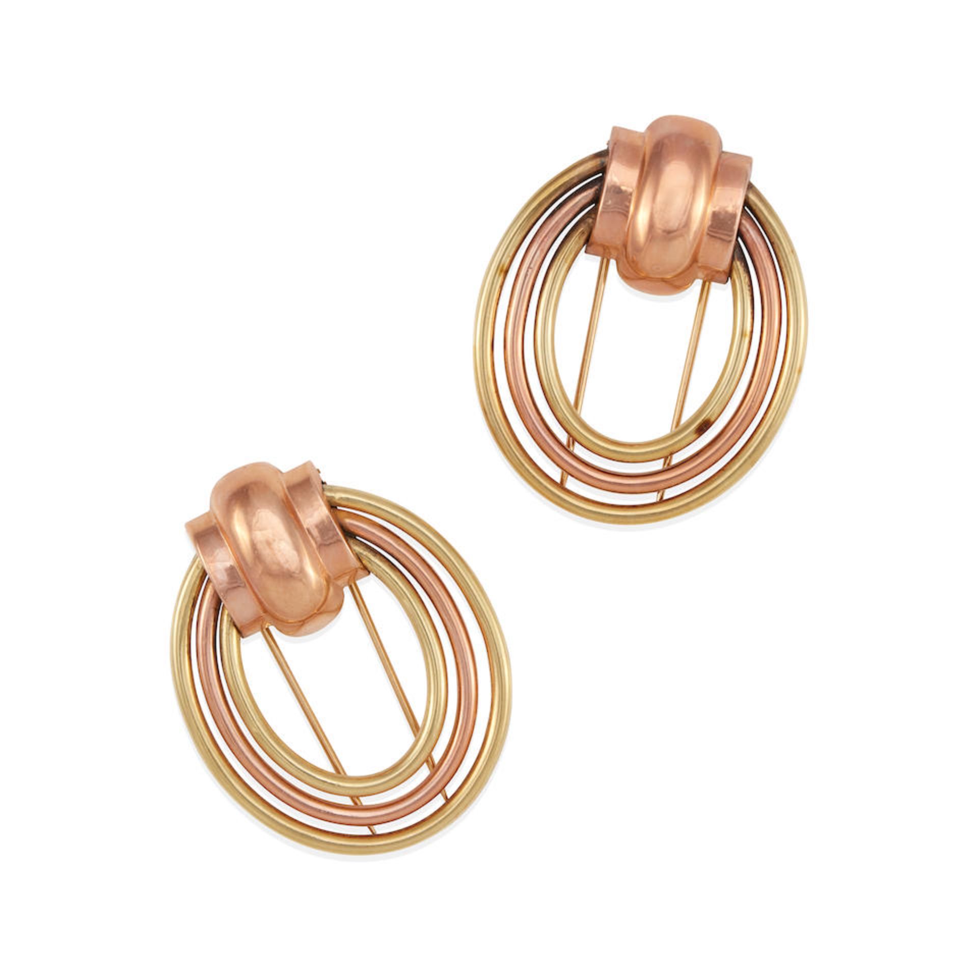 A PAIR OF 14K BI-COLOR GOLD CLIP BROOCHES