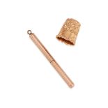 A ROSE GOLD THIMBLE AND RETRACTABLE TOOTHPICK