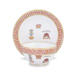 A Coalport breakfast cup and saucer from the Reverend William Nelson service, circa 1806-08