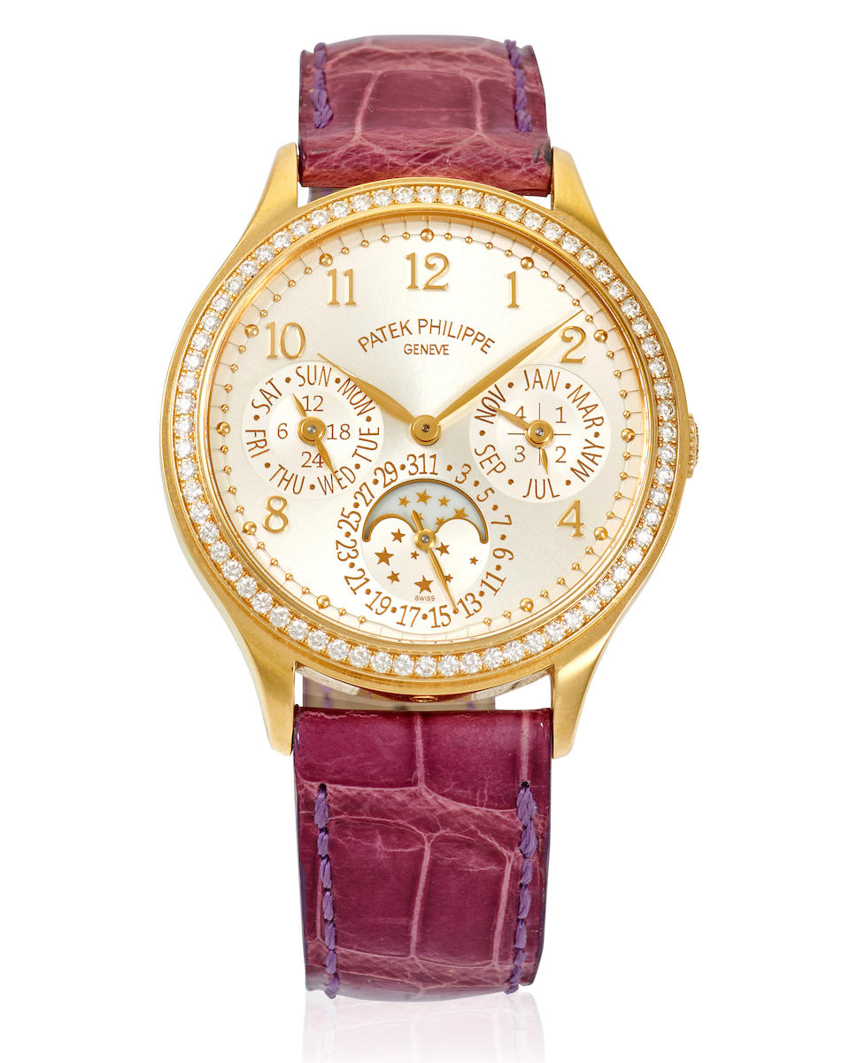 PATEK PHILIPPE. AN 18K ROSE GOLD AND DIAMOND SET AUTOMATIC CALENDAR WRISTWATCH WITH MOON PHASE G...