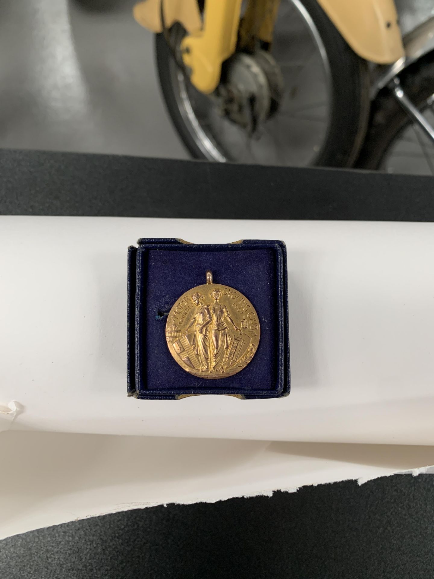 A boxed 1924 Motor Cycling Club London-Edinburgh Run 9ct gold winner's medal, awarded to George ...