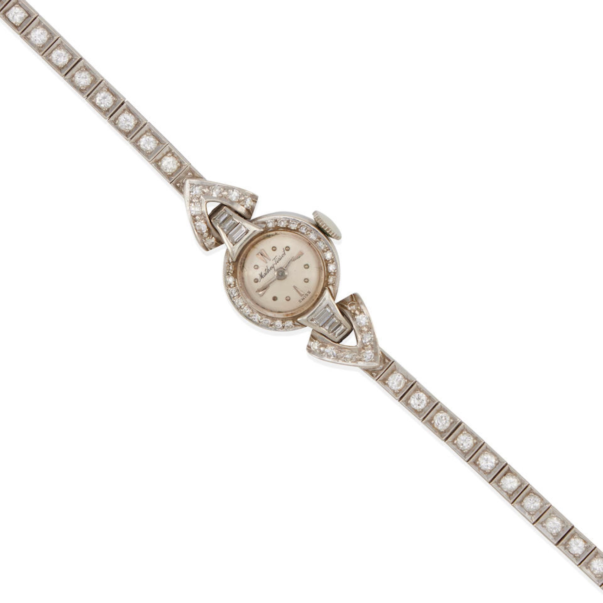 MATTHEY TISSOT: A 14K WHITE GOLD AND DIAMOND WRISTWATCH