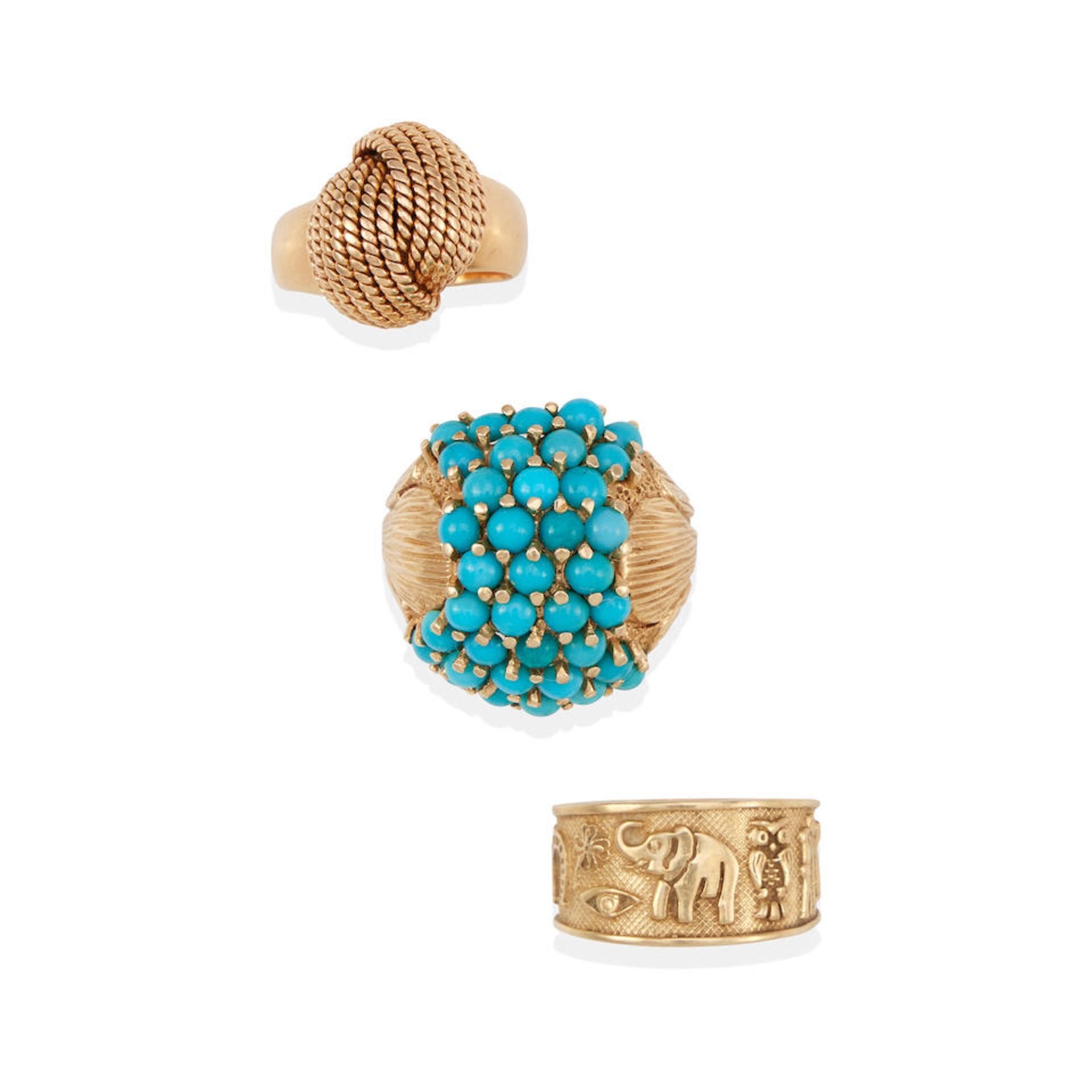 THREE GOLD AND TURQUOISE RINGS