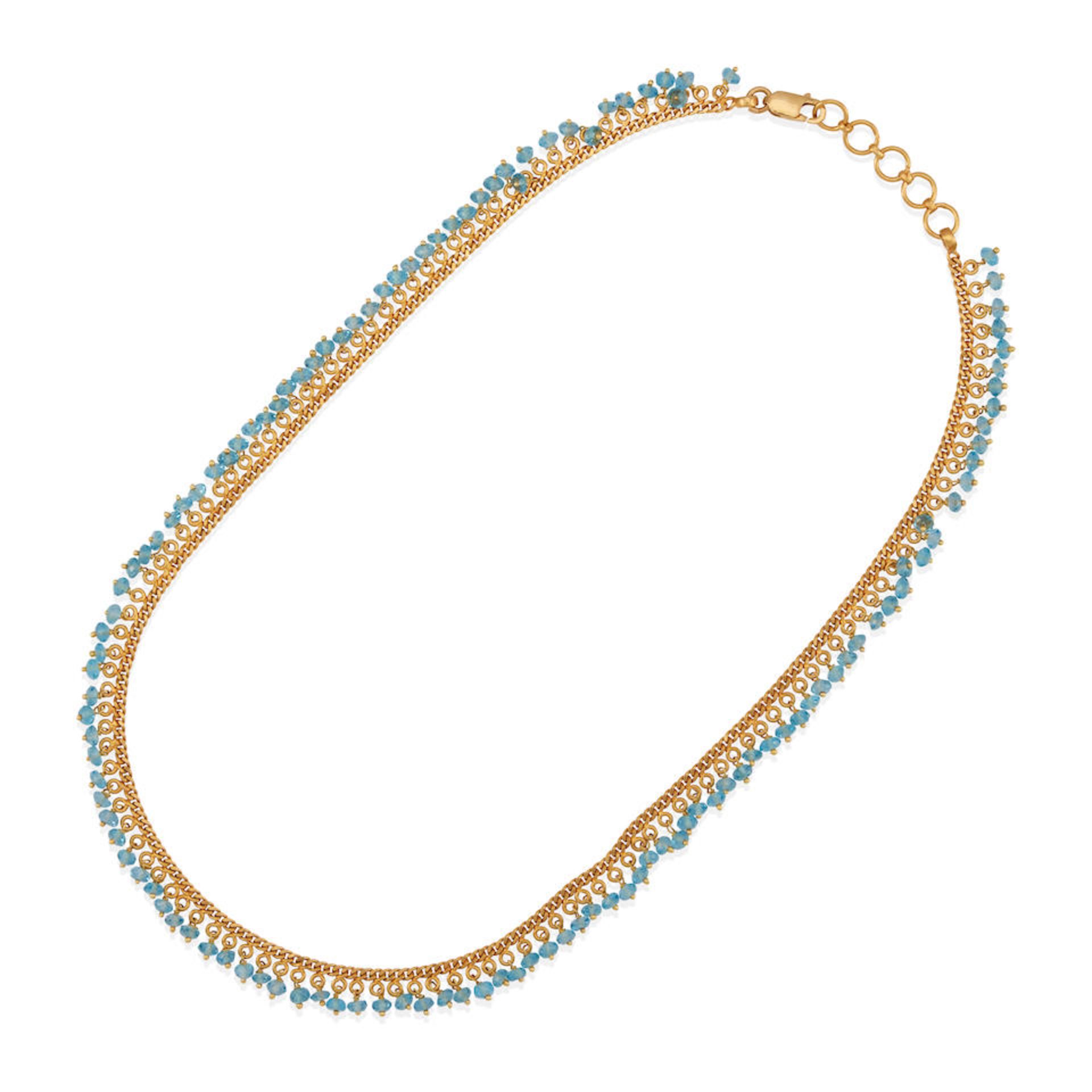 AN 18K GOLD AND BLUE TOPAZ FRINGE NECKLACE