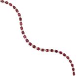 A GOLD, RUBY, AND DIAMOND BRACELET