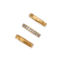 TWO 18K GOLD BANDS TOGETHER WITH AN 18K GOLD AND DIAMOND BAND