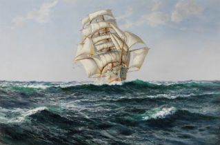 Montague Dawson (British, 1890-1973) A white hulled ship, almost certainly the Abner Coburn, und...