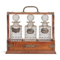 EDWARDIAN BRASS BOUND OAK TANTALUS WITH THREE PRESSED GLASS BOTTLES/DECANTERS