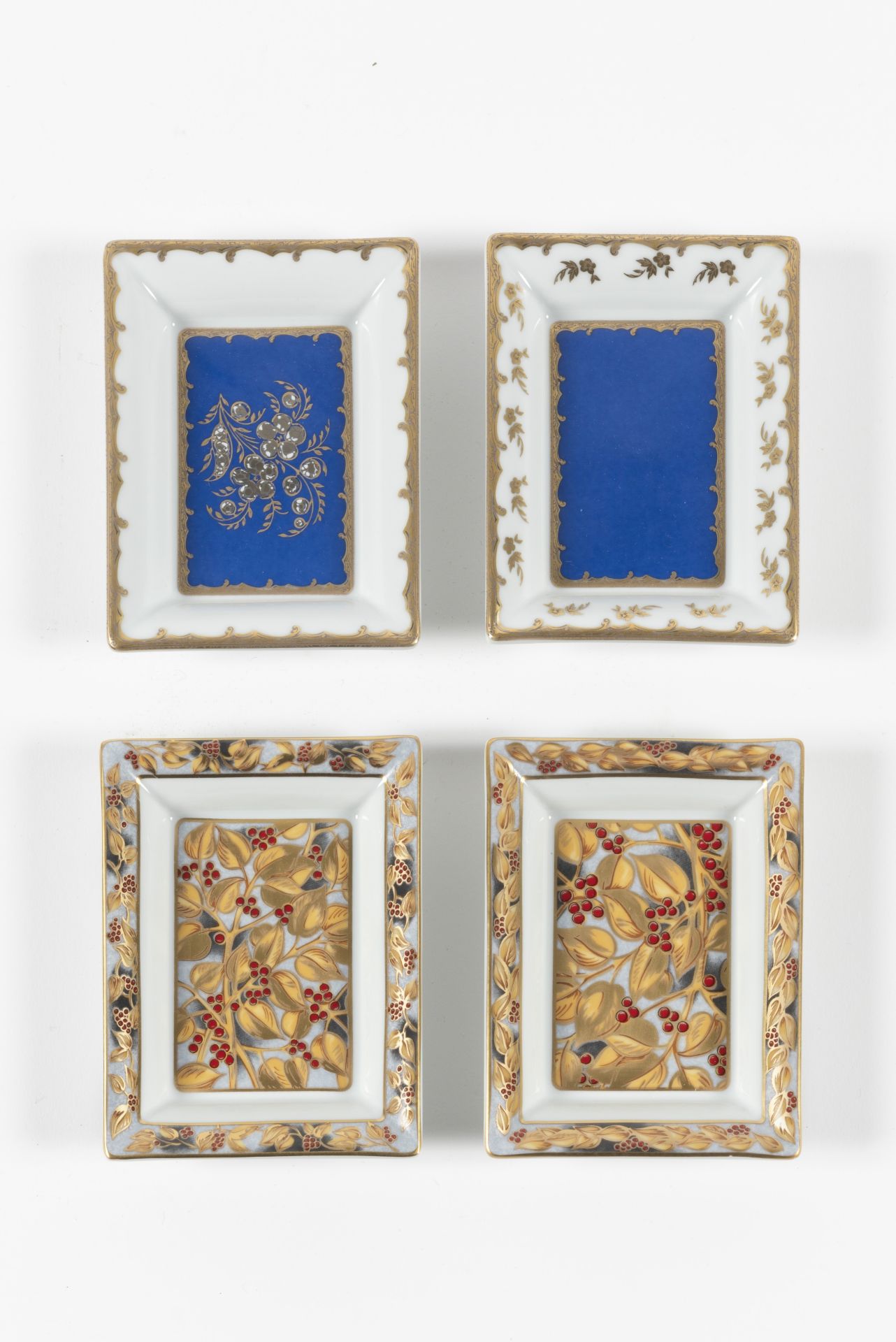 PATEK PHILIPPE Suite de deux paires de petits vide-poches en porcelaine de Limoges