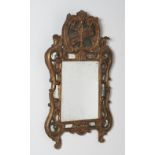 Miroir &#224; parecloses en bois sculpt&#233; et dor&#233;, &#233;poque R&#233;gence, 18e si&#23...